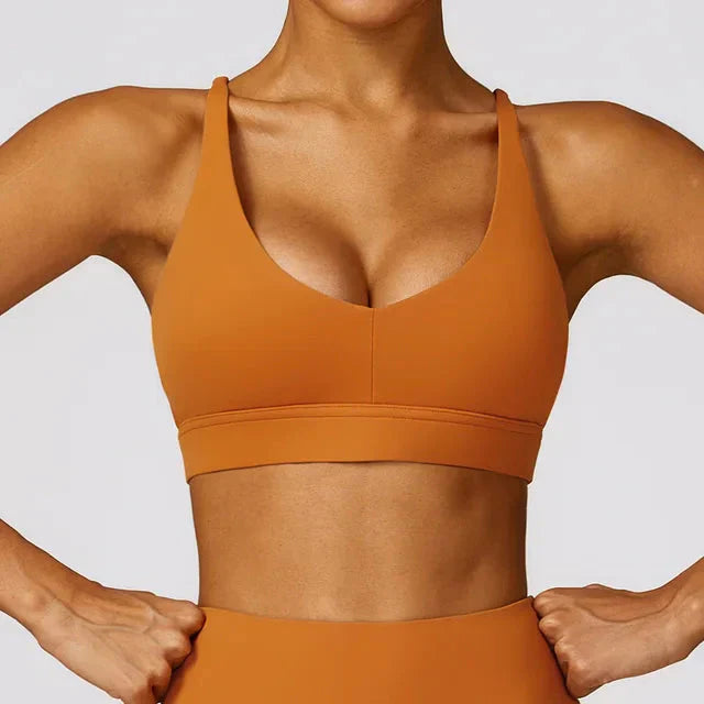 Elevate Your Workout with the Reflex Cross-Back Sports Bra